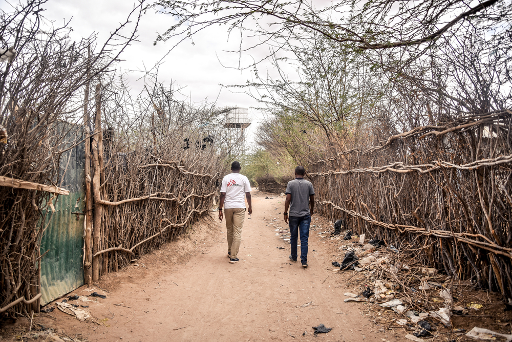 MSF Staff walking through one of the streets in Dagahaley camp, Dadaab, Kenya
