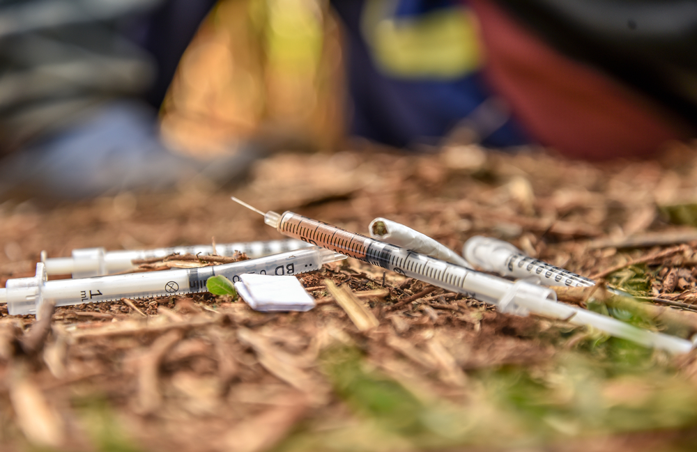 Used syringes laying on the ground in one of the 'drug dens' in Kiambu