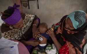 Nurse Ndoungamandji Solange, examines a child in Massakori, Chad