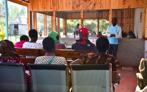  Meshak Aoko, a community health promoter takes patients through a health education session in Nyalkinyi Health Center under the differentiated service delivery model