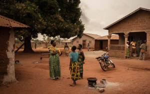 Lucienne, 25, woman leader, talks to women in her village, Agbodonhouin, Benin, 16 January 2025.