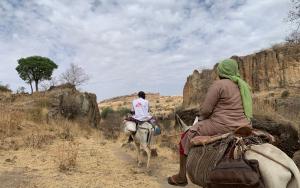 MSF team on their way to Dilli village to deliver healthcare supplies. Jebel Marra Mountains, Darfur Region. Sudan