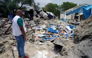  MSF HoM in front of the bombarded warehouse
