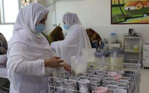 MSF nurses distribute therapeutic milk to the caretakers of children with severe acute malnutrition admitted to the inpatient therapeutic feeding centre at Boost Provincial Hospital in Helmand province. 