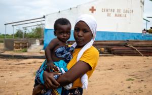 Marcia, a resident of Nanlia community, visited the health center for a medical follow-up for her daughter. Nanlia Health Center serves a population of 61,180, including many displaced by the conflict.