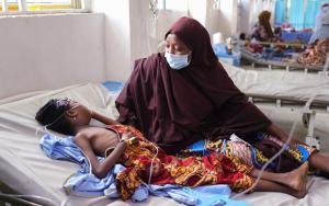 Halisa Mahmud looks caringly at her 11-year-old daughter Halima Arma, who is on admission for diphtheria, at the Intensive Care Unit of the Infectious Diseases Hospital, Kano state, northwest Nigeria.