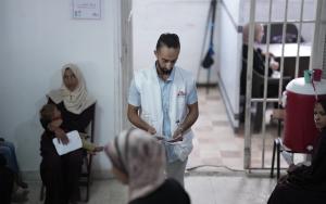 MSF staff arranging the entry of patients to the medical staff in Gaza clinic in Gaza city. 