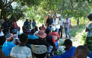 Community engagement with local leaders at a traditional "Cow Head" gathering named for the cow's-head meal shared with community elders, a mark of respect in the local custom, where our team promote information on improving access to care for survivors of sexual violence, followed by a shared meal with the community.