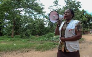 Gertrude raises awareness on cholera infection and spread  in Mulongo's neighborhoods