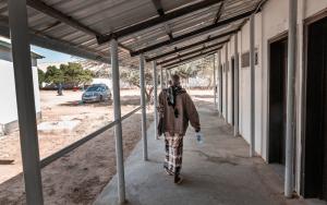 Declared cured a patient is leaving to go home. Follow-up testing will confirm no relapse 