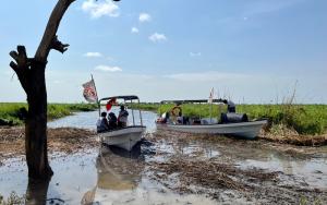 MSF teams travel 2 hours by speedboat in Ulang to reach communities displaced by floods