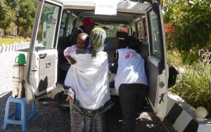 MSF staff transport a patient during a mobile clinic in Hawzen, northeast Tigray