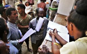 Administrators register newly arrived displaced people at Tsegay Berhe