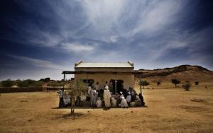 An MSF team talks to a group of men in Dar Zaghawa, in North Darfur state
