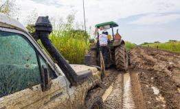 MSF uses a tractor to navigate mud bogs.