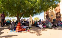 Renk - A crowd of returnees and refugees waits in line  to receive care from the MSF mobile clinic team at Jerbana