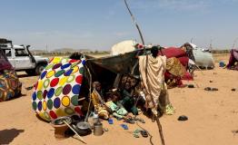 Makeshift shelter made of four wooden poles and bedsheets, where Hawa Abdallah lives with her husband and five children. The family arrived in Tawila on October 15 after fleeing intense bombings on October 11 in El Fasher. 