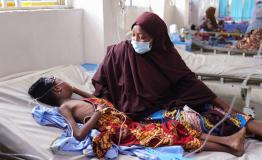 Halisa Mahmud looks caringly at her 11-year-old daughter Halima Arma, who is on admission for diphtheria, at the Intensive Care Unit of the Infectious Diseases Hospital, Kano state, northwest Nigeria.