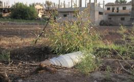 Fields and streets in Deir ez-Zor contaminated with landmines, unexploded ordnance, rockets, and booby traps.