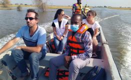 Wading the flood waters, enduring bees attack to deliver medical services in Jonglei