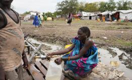 A woman fetching water from an MSF water point, in the town of Pibor, Boma state, South Sudan