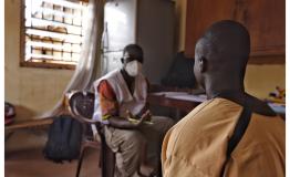 in Makeni Correctional Centre in Sierra Leone during a screening session for TB with an inmate in th