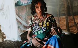 Mariam gave birth to her son Isyaka while fleeing her village,