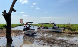 MSF teams travel 2 hours by speedboat in Ulang to reach communities displaced by floods