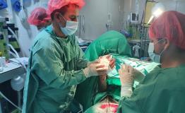 MSF surgical teams perform an operation on a patient injured by the fighting in Kunduz 