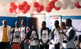 Local volunteers, health workers and MSF staff members celebrated the opening of mental health activities in West Point, Liberia. [© Clément Lier/MSF] 