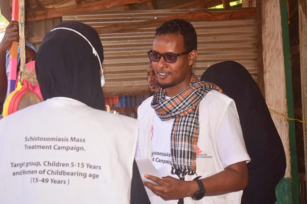 Mohammed Bishar, HP supervisor talking to one of the team members during the Mass Drug Administration campaign. MSF Teams have been working in Dagahaley since 1991. Dagahaley is currently home to approximately 104,051 refugees, fleeing instability in Somalia and the devastating effects of drought. It is one of the 4 camps of Dadaab Refugee complex in Kenya, hosting over 416,403 refugees.