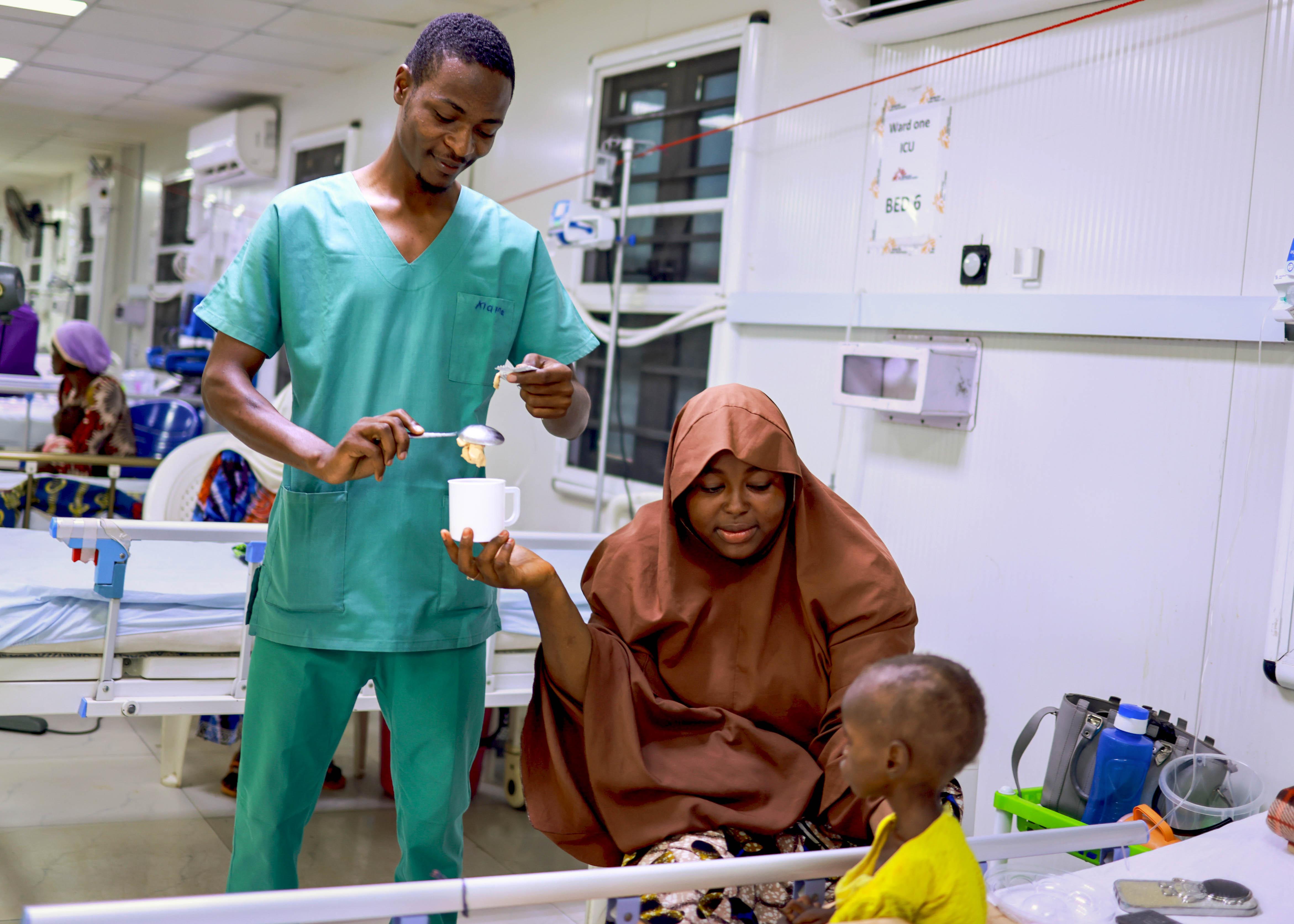 Maryam receivess therapeutic food at the intensive care ward of MSF’s inpatient nutrition centre in Maiduguri. 