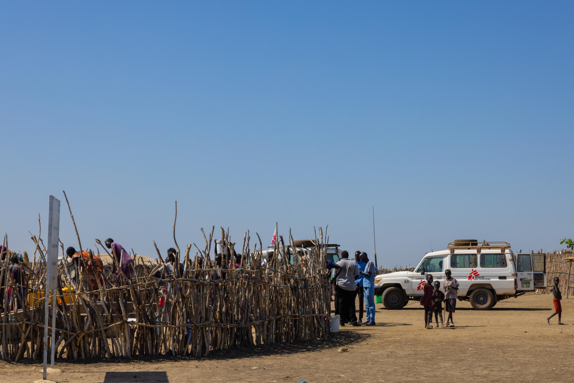 People collect water from a newly constructed borehole in Zamlet village in Rubkona County of Unity State.