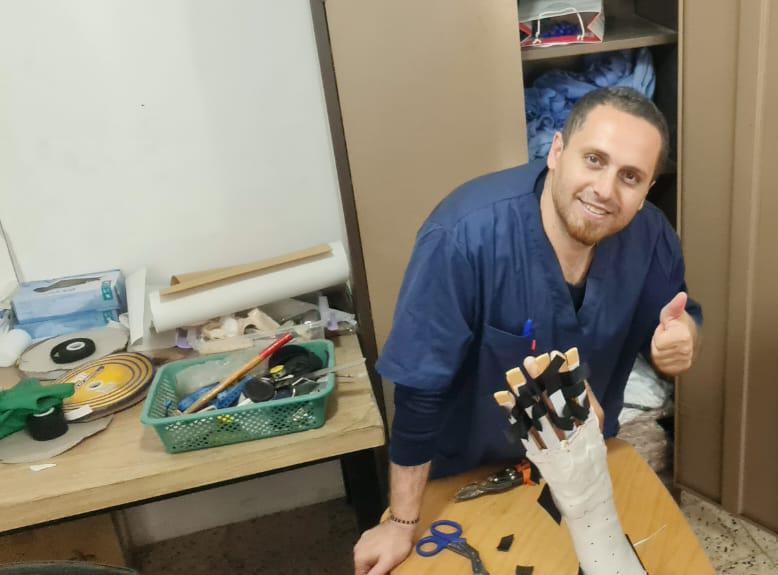 Omar Hayek, working at the Gaza Clinic