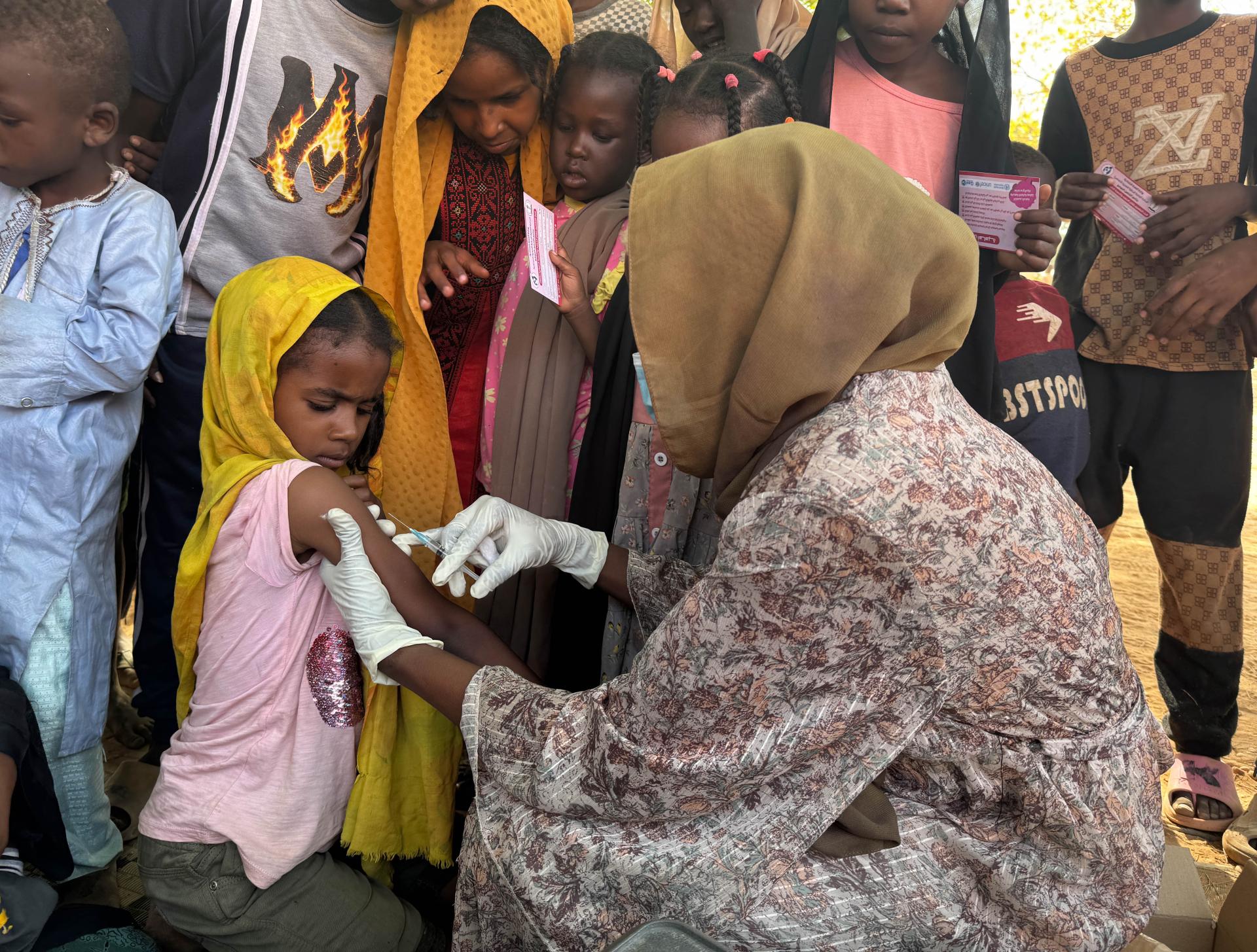 Eight-year-old Shayma at the vaccination site in Alsafa, El Geneina. She decided to attend after seeing her family and neighbors join the campaign. 'The injection didn’t hurt and now I am protected. Family and friends came to get vaccinated, so I came,' she said. Community influence remains a key factor for the high turnout in this MSF-MoH emergency measles and rubella response.