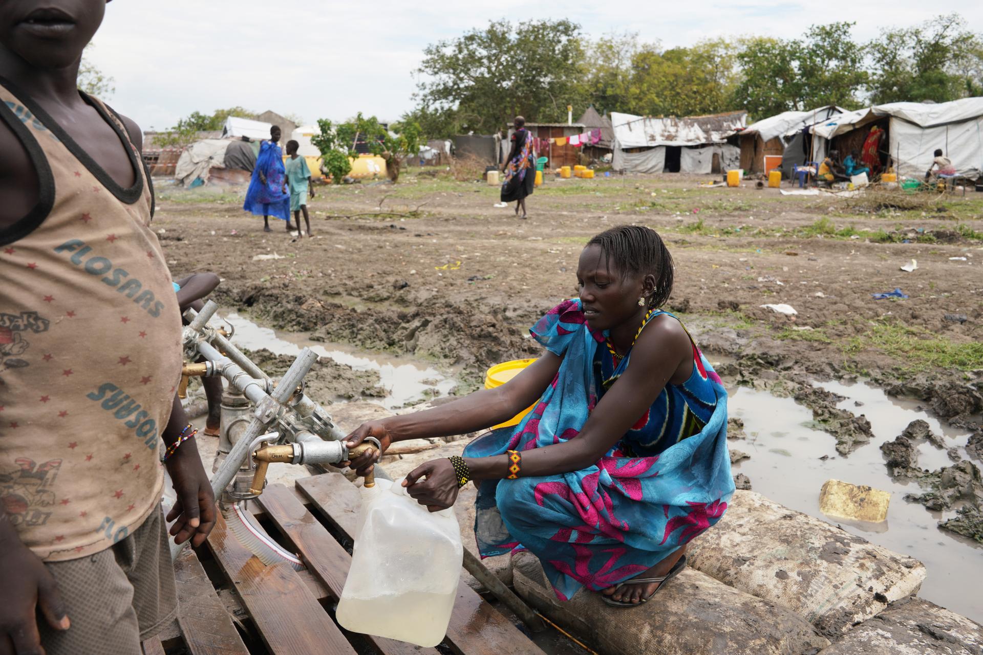A woman fetching water from an MSF water point, in the town of Pibor, Boma state, South Sudan