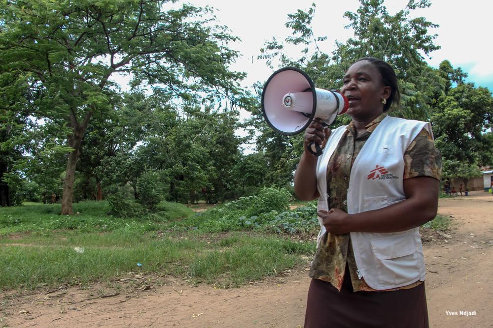 Gertrude raises awareness on cholera infection and spread  in Mulongo's neighborhoods