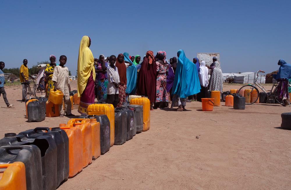 Women queue up at a borehole in Gwoza to collect water.© Scott Hamilton/MSF