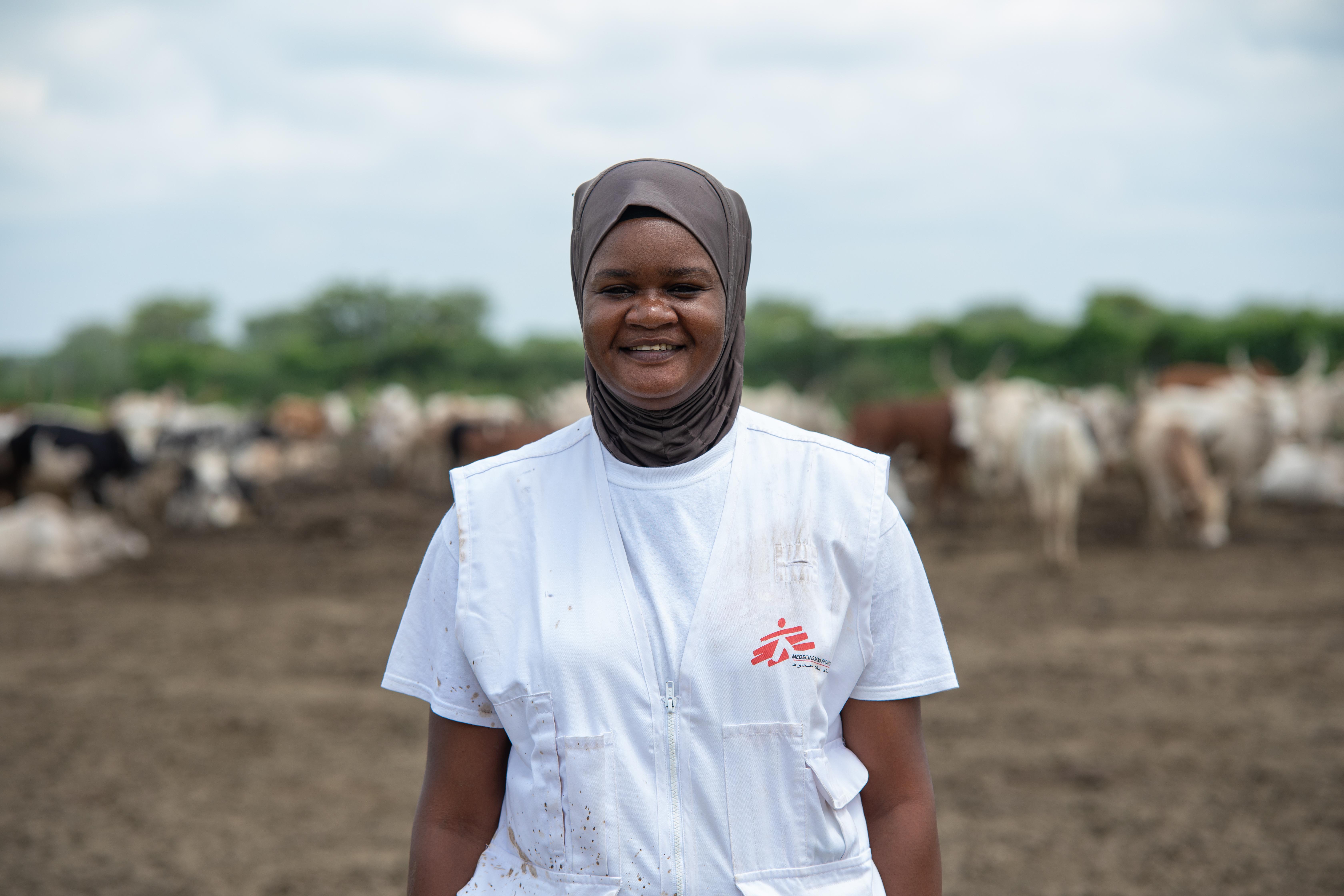 With a smile that reflects the impact of their work, an MSF Nurse Activity Manager, Awa Abdumadou poses for a photo after vising on of the Integrated Community Case Management (ICCM) sites.