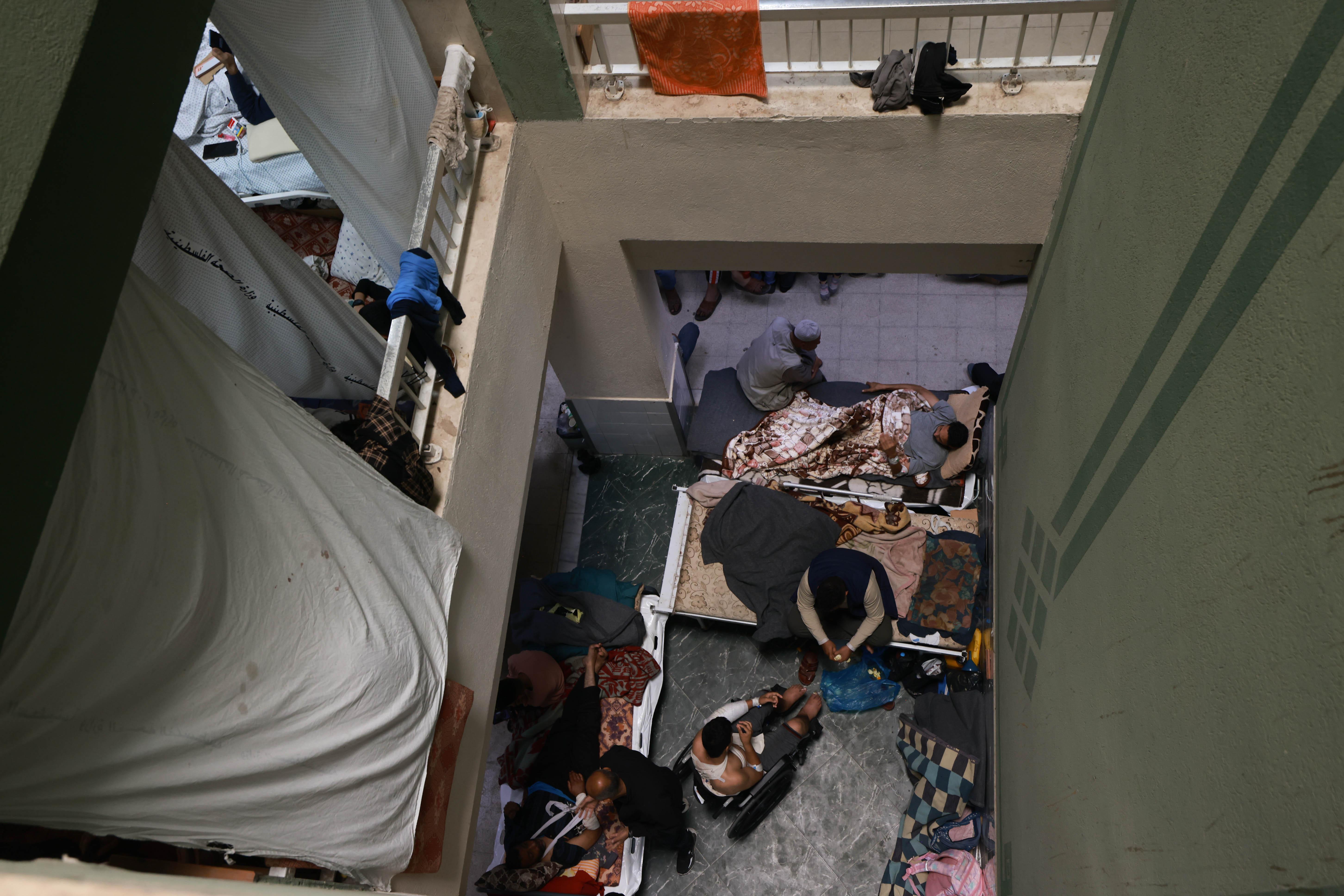 An above view of a crowded hallway at Al-Aqsa hospital
