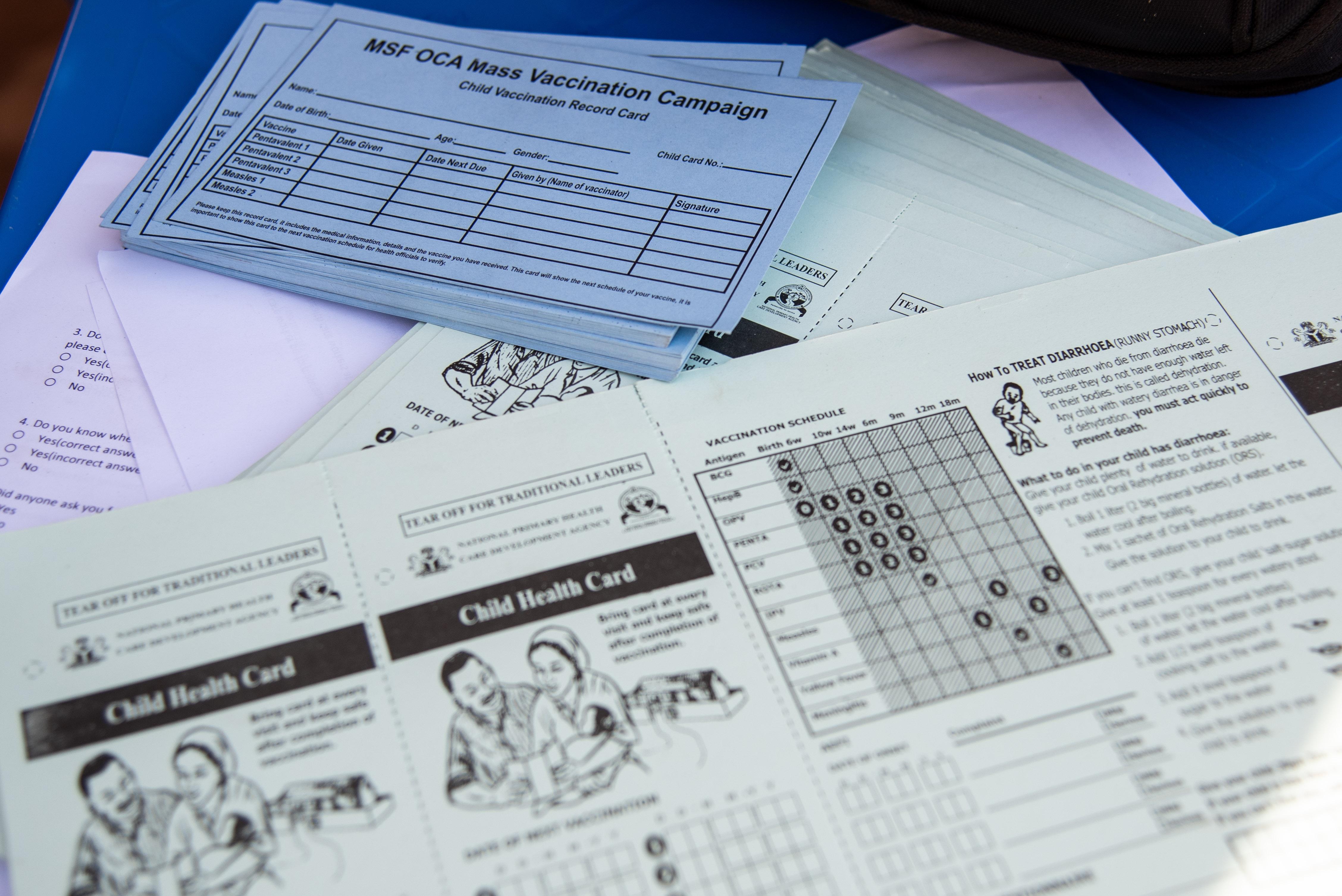 MSF vaccination cards and information sheets that are being used in the community as part of the mass vaccination campaign for children in Sokoto.