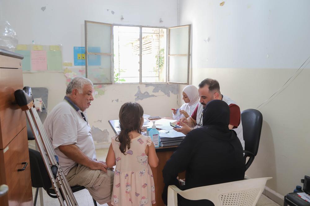 Samira Hamze and her family (husband and granddaughter) frequent the MSF mobile clinic in Nabatieh
