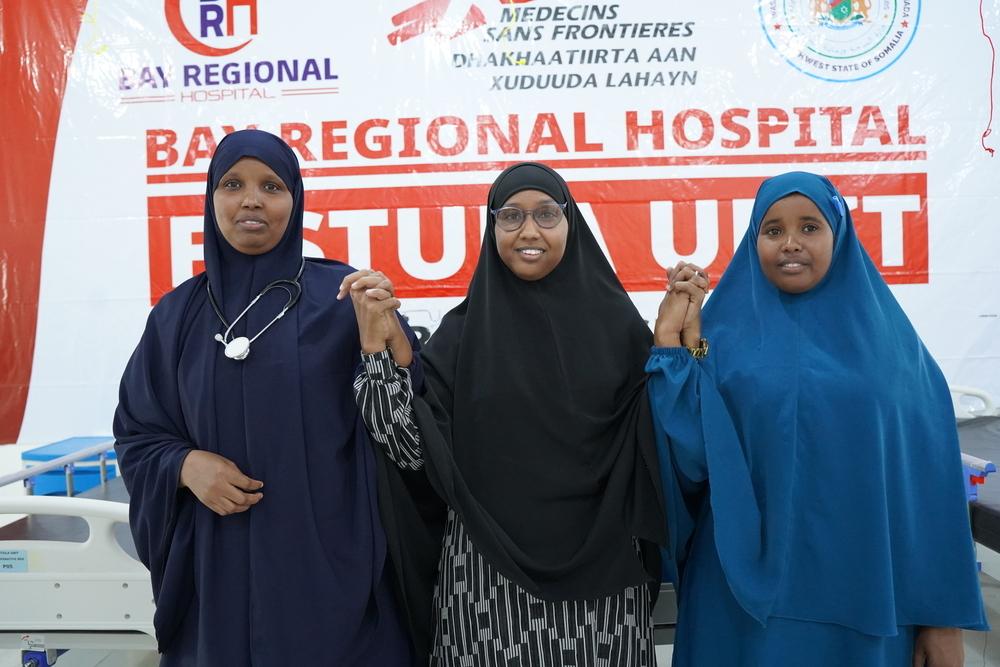 Fartun, Kaltumo and Farhia, members of the fistula unit medical team, stand together at the fistula unit at the MSF-supported Bay Regional Hospital in Baidoa, Somalia.