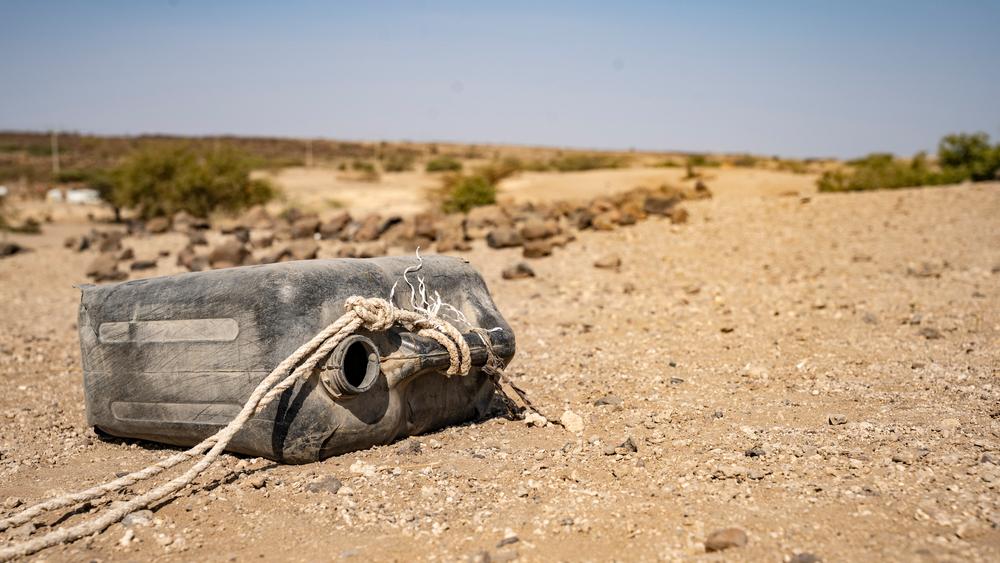  A broken water jerrycan laying on the ground in Shekoytia.