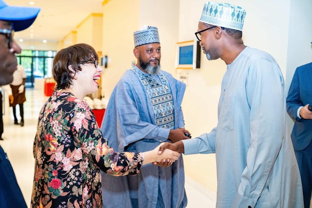 MSF Country Representative, Dr. Ahmed Aldhikhari shakes hands with MSF colleagues and other guests arriving at the event in Abuja to commemorate MSF’s 30 years of medical and humanitarian work in Nigeria.