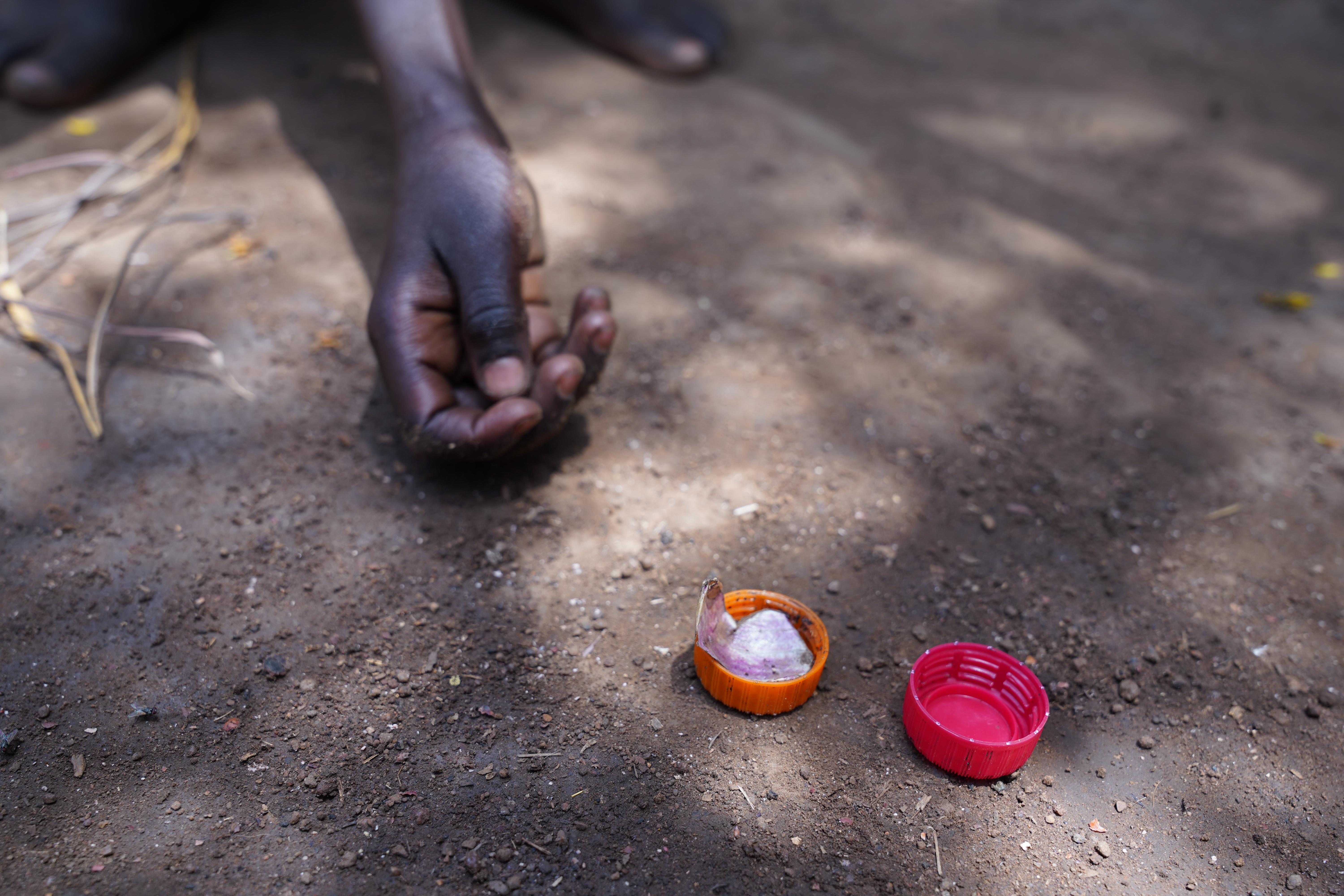 Kids playing using bottle caps as toys in Kule Refugee Camp, Gambella Region, Ethiopia. 2026