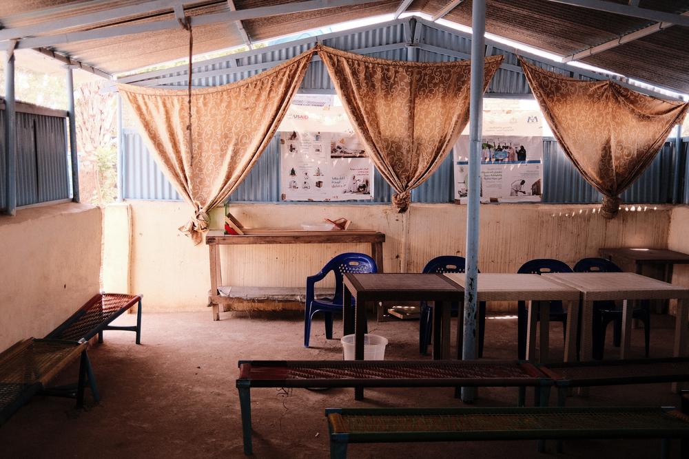 An empty treatment area at a primary health care facility in Hamidya which saw much of its funding cut by international donors. The facility is still able to provide mental health services for survivors of sexual violence but many of the primary health care activities it provided to pregnant women, mothers, and children are not functioning.