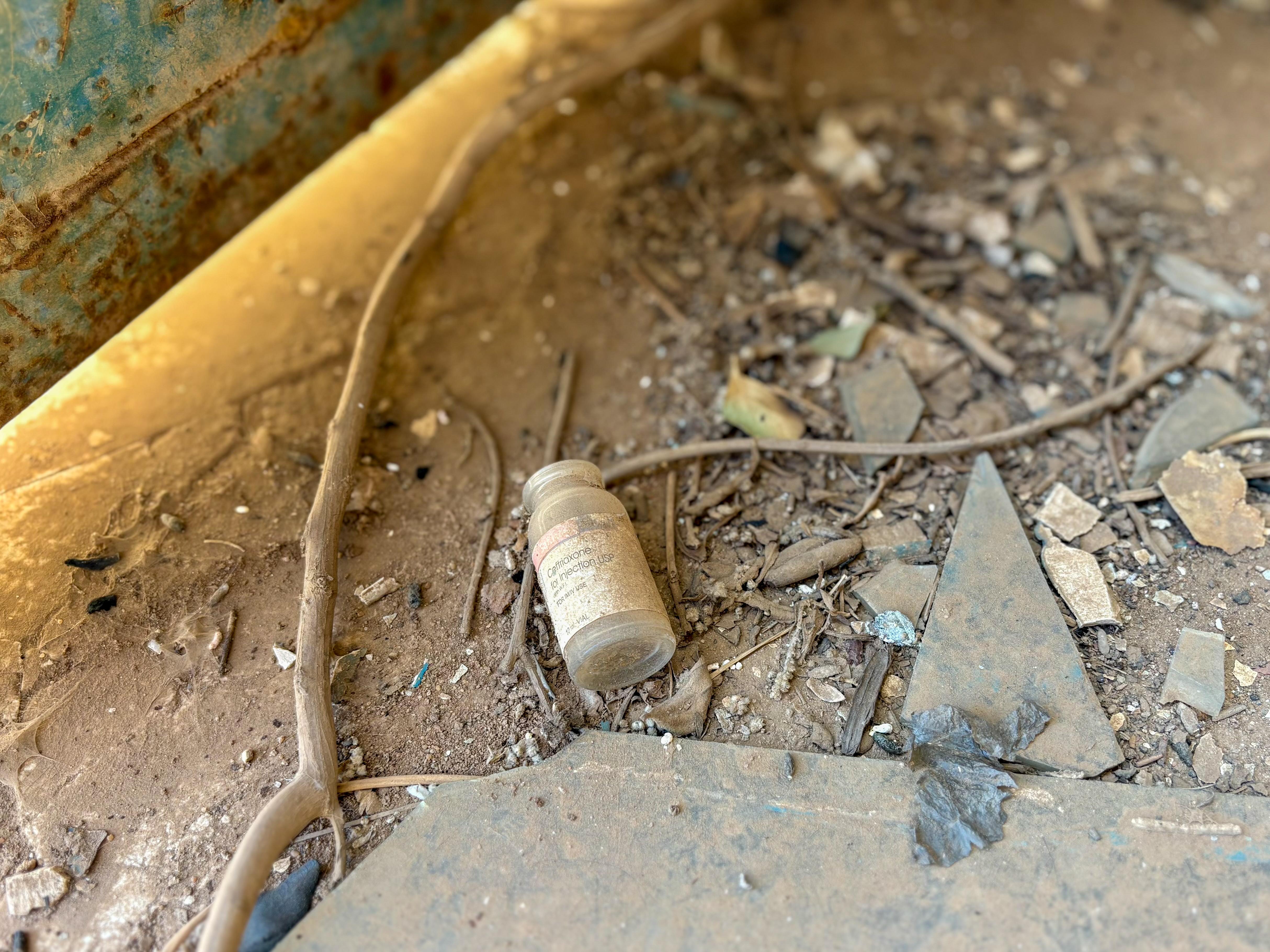 Old medicine bottle left behind in the former HIV care unit which was abandoned when the war broke out. Since then, MSF has set up a new space in a nearby building.